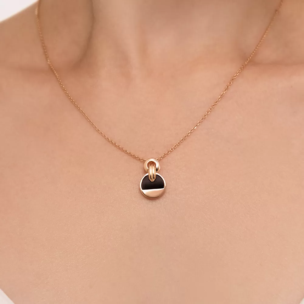 Anhänger aus Rotgold 585, mit Onyx, Durchmesser ca. 12 mm, Höhe ca. 18 mm